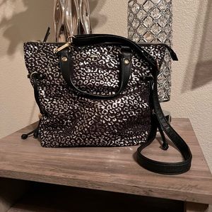 Juicy Couture black & silver leopard print crossbody purse.